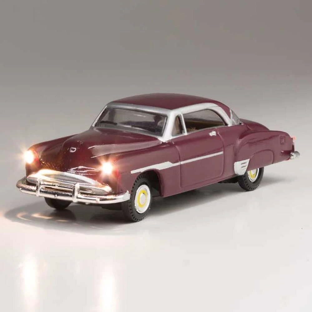 Woodland Scenics Just Plug? Lighted Vehicle -- Downtown Drive - Sedan (maroon) - HO - JP5601 1 Woodland Scenics Just Plug? Lighted Vehicle -- Downtown Drive - Sedan (maroon) - HO - JP5601