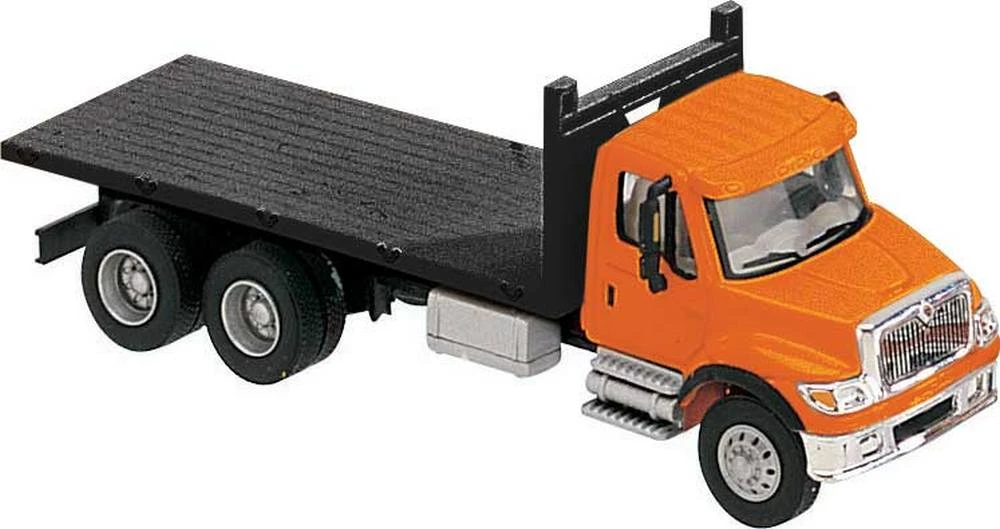Walthers SceneMaster International? 7600 3-Axle Flatbed Truck - Assembled -- Orange Cab, Black Fla